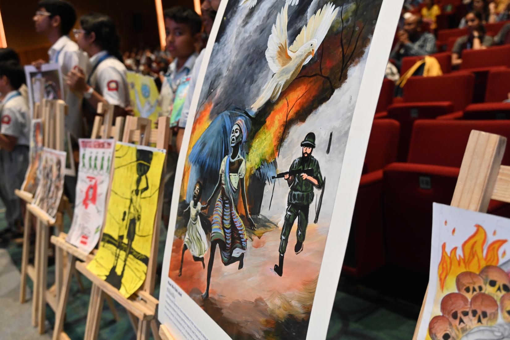 School children from India display their art to pay tribute to the 1994 Genocide against the Tutsi in Rwanda, when more than one million people were systematically killed following years of misinformation, disinformation and hate speech exacerbating ethnic tensions.
