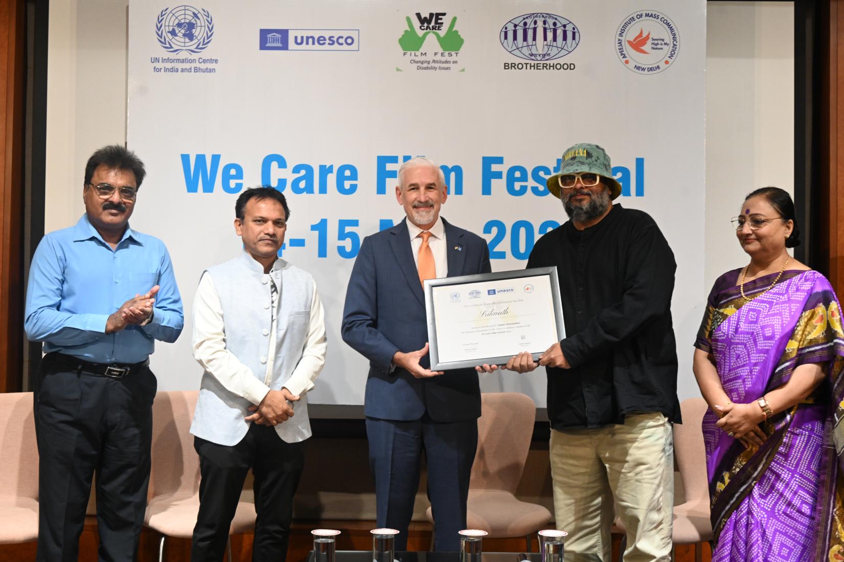 Goa State Commissioner for Persons with Disabilities Guruprasad Pawaskar, United Nations India Resident Coordinator Shombi Sharp, Special Olympics Bharat Chairperson Dr. Mallika Nadda and We Care Film Festival co-organiser Satish Kapoor felicitated winning entries selected from a pool of films from around the world by a jury at the We Care Film Festival at UN House in New Delhi. 