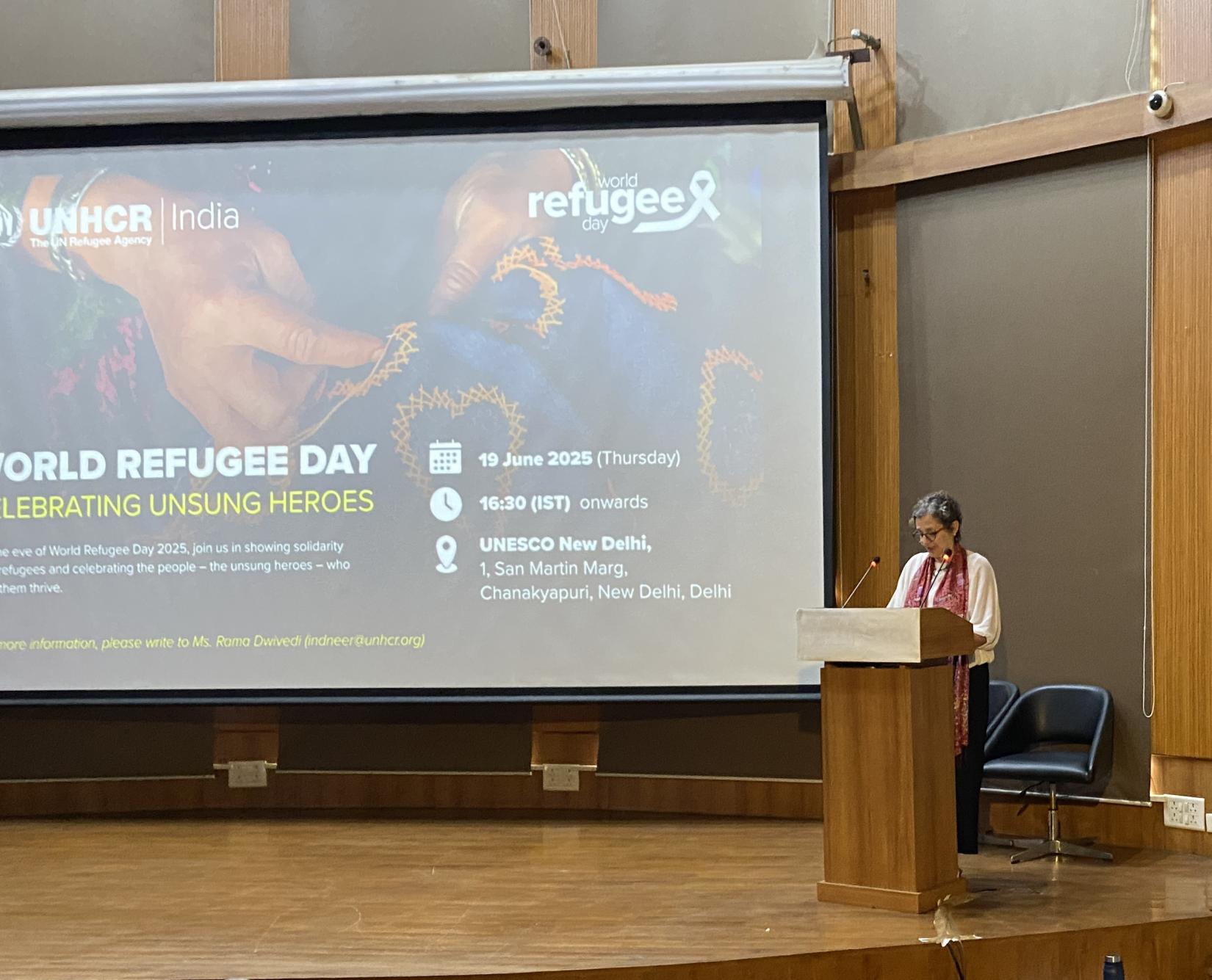 Chief of Mission for UNHCR India Areti Sianni addresses the gathering at the World Refugee Day commemoration at UNESCO House in New Delhi.