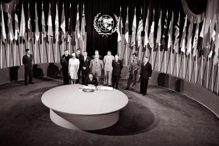The UN Charter being signed by a delegation at a ceremony held at the Veterans’ War Memorial Building on 26 June 1945.