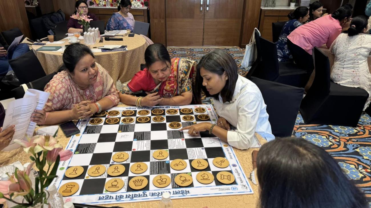 Participants at the consultations try out a special chessboard, designed to serve as an educational tool to instill the core principles of the United Nations Standard Minimum Rules for the Treatment of Prisoners – also known as the Nelson Mandela Rules - into the daily operations of prison management