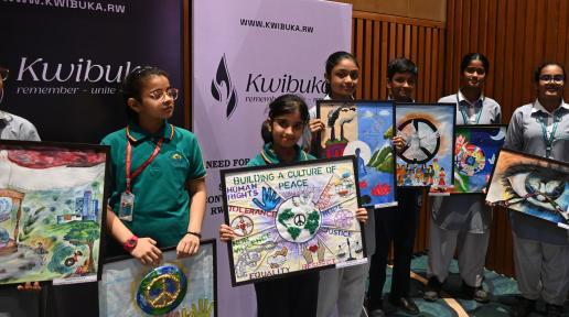 School children pay tribute to the lives lose in the 1994 genocide against the Tutsi in Rwanda at a commemorative event in New Delhi. 